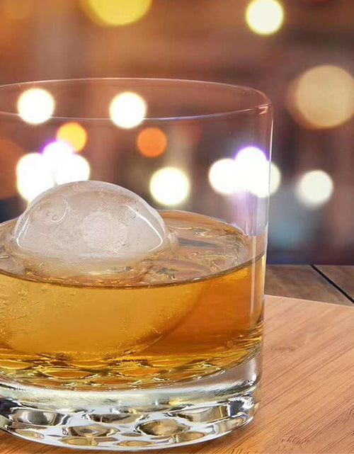 Load image into Gallery viewer, 4 Hole Ice Cube Maker Whisky Cocktail Ice Mould Round Ice Hockey Mold
