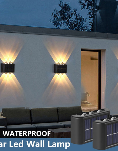 Load image into Gallery viewer, New Solar Wall Lights Outdoor Waterproof Led Solar Lamp Up And Down
