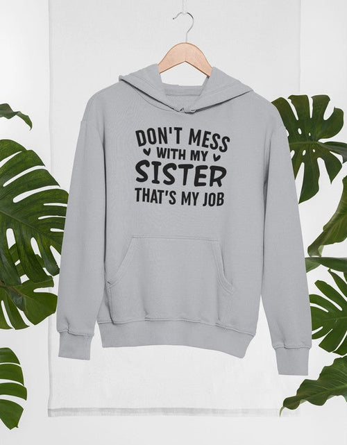 Load image into Gallery viewer, Don&#39;t Mess With My Sister That&#39;s My Job Hoodie
